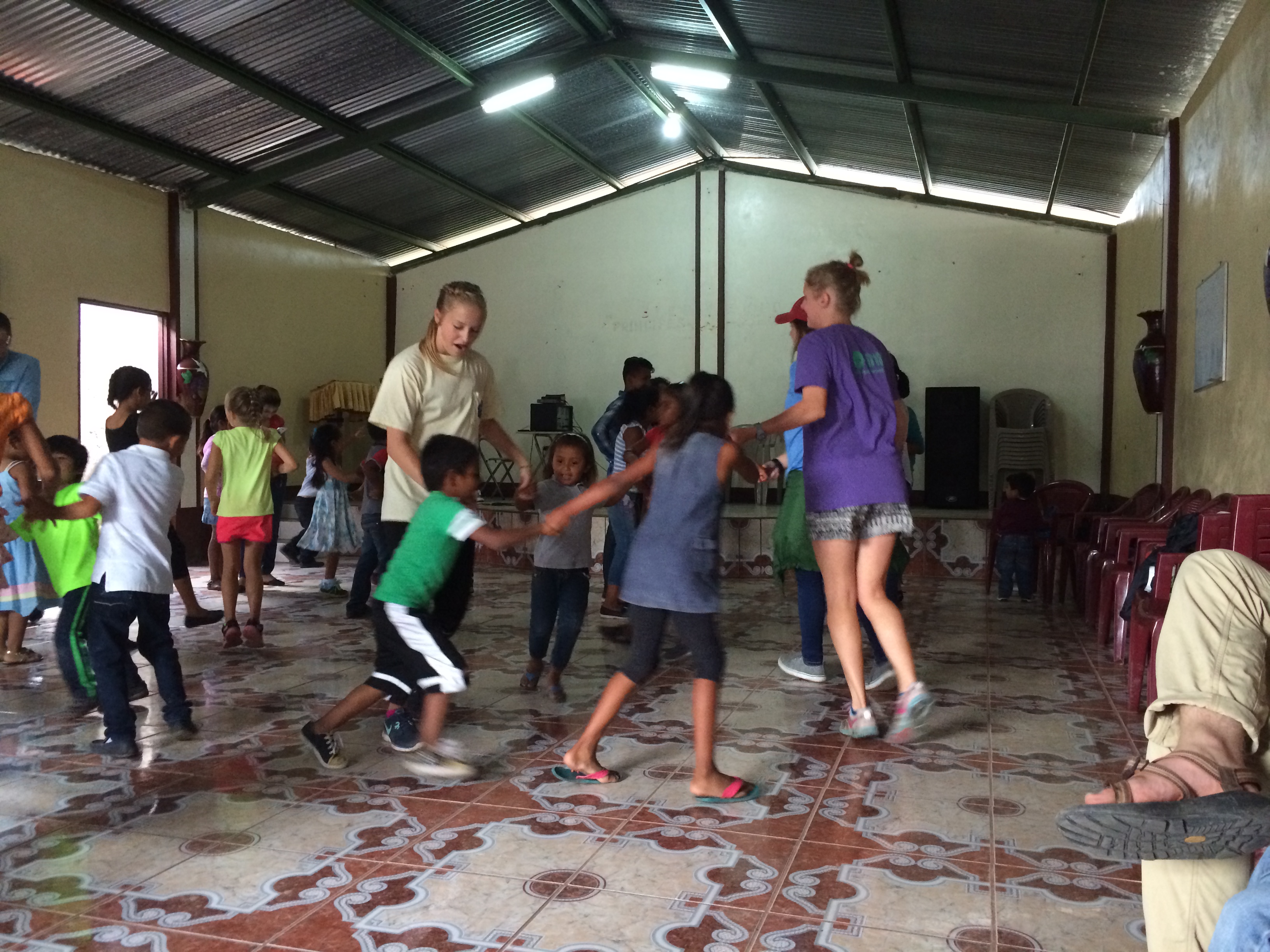 Dancing to the music with the kids.